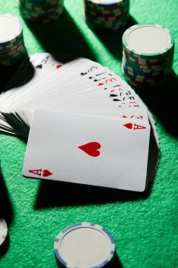 Professional baccarat dealer at live table